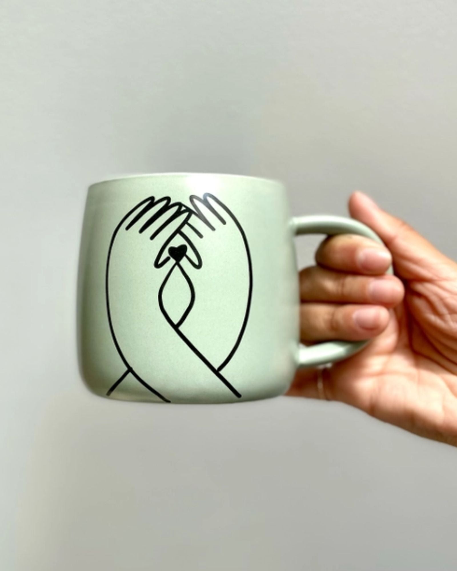 SAFE AND CARED FOR - MUG