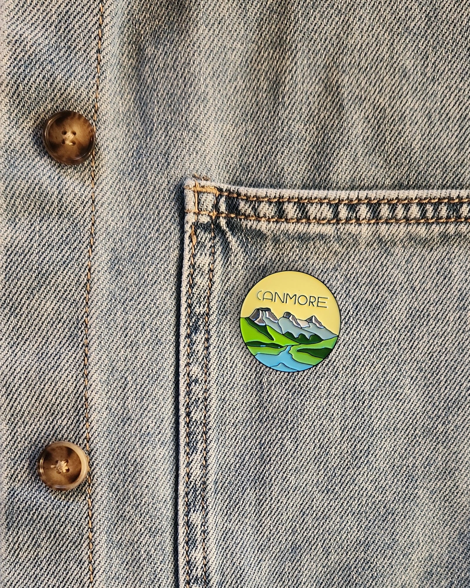 YELLOW CANMORE ENAMEL PIN