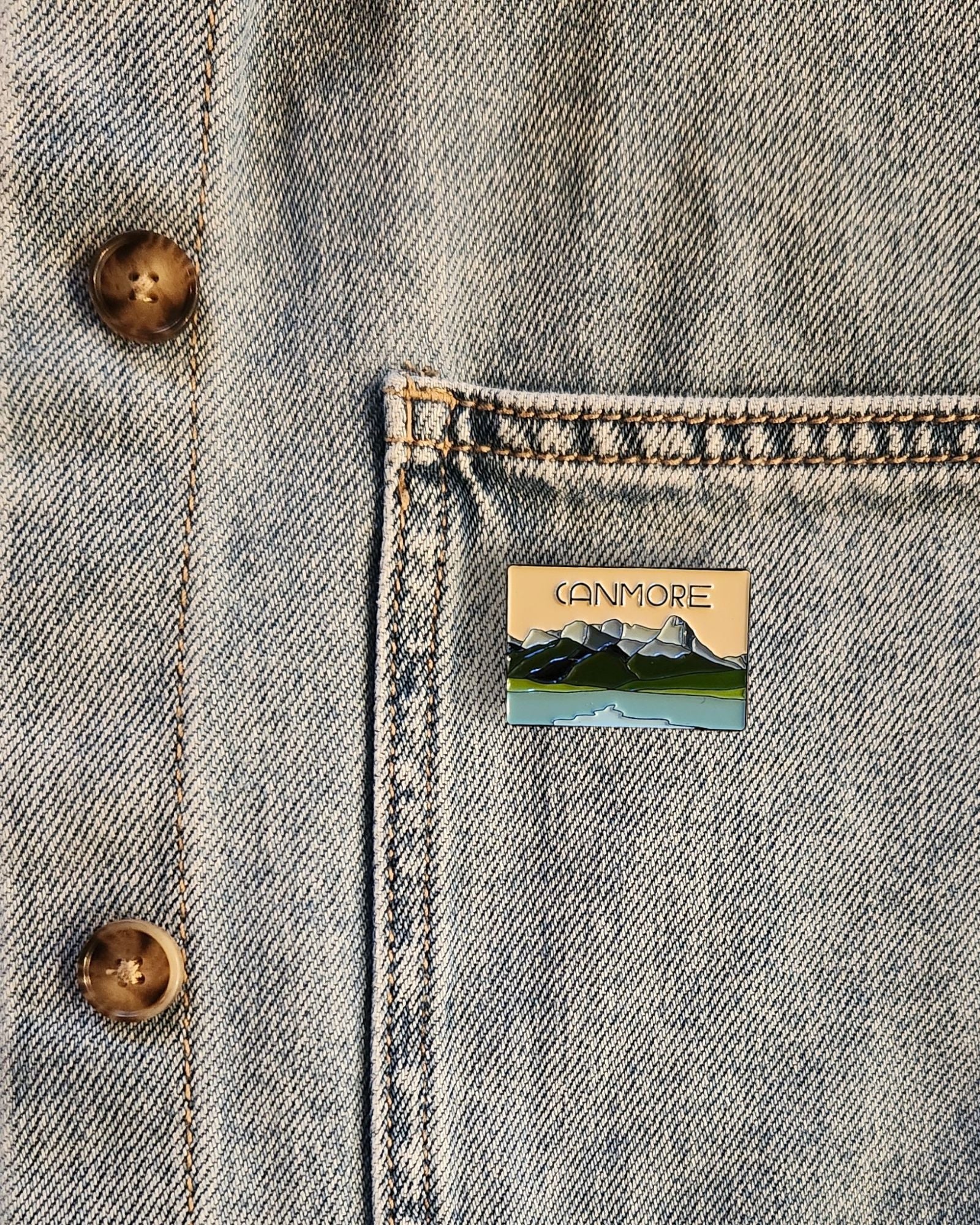 ORANGE CANMORE ENAMEL PIN