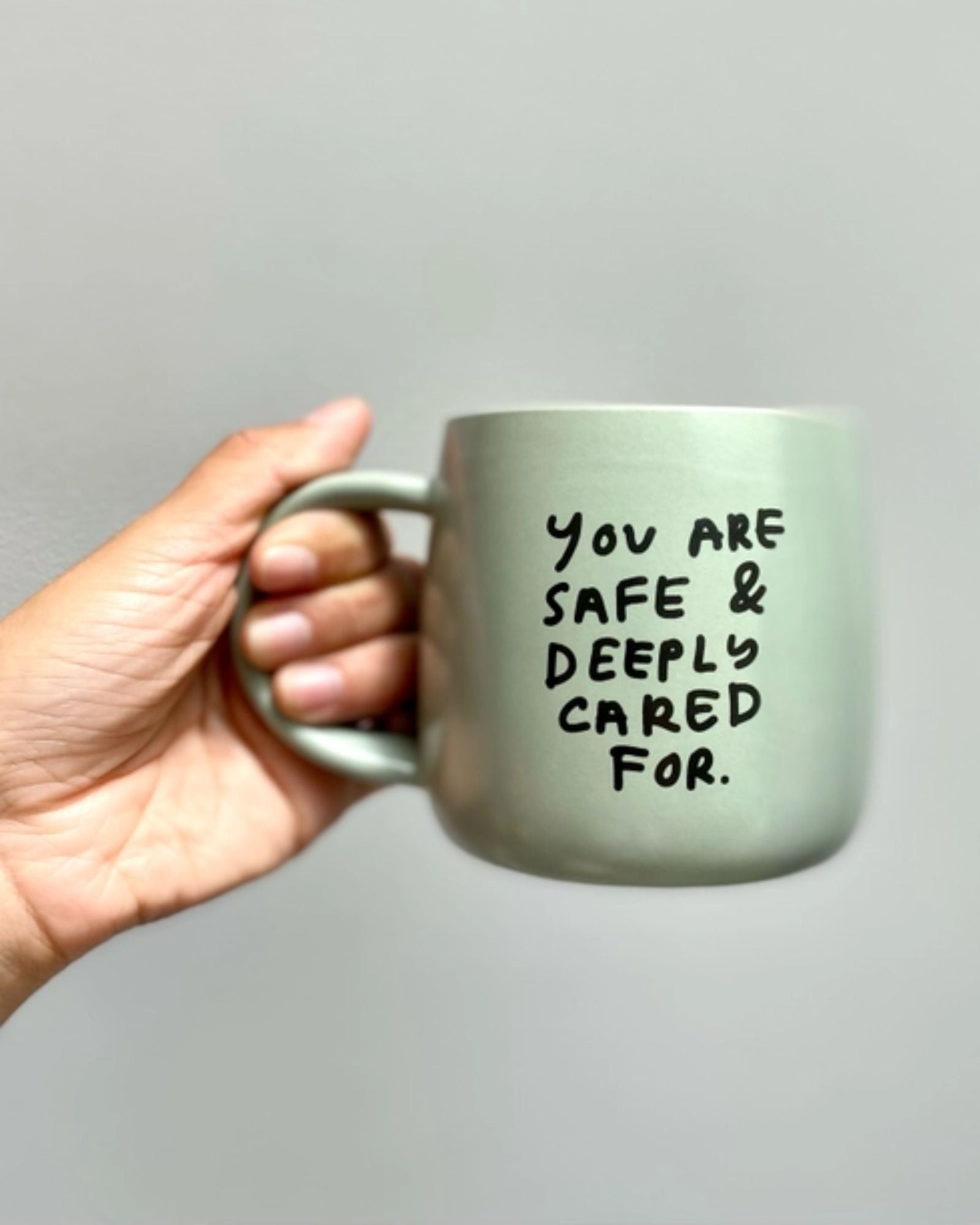 SAFE AND CARED FOR - MUG